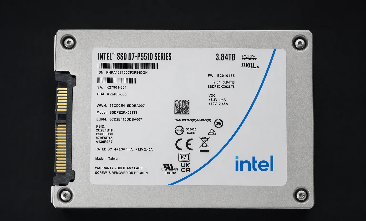 Intel SSD D7-P5510 3.84TB enterprise U.2 NVMe drive, top label view, dark studio.