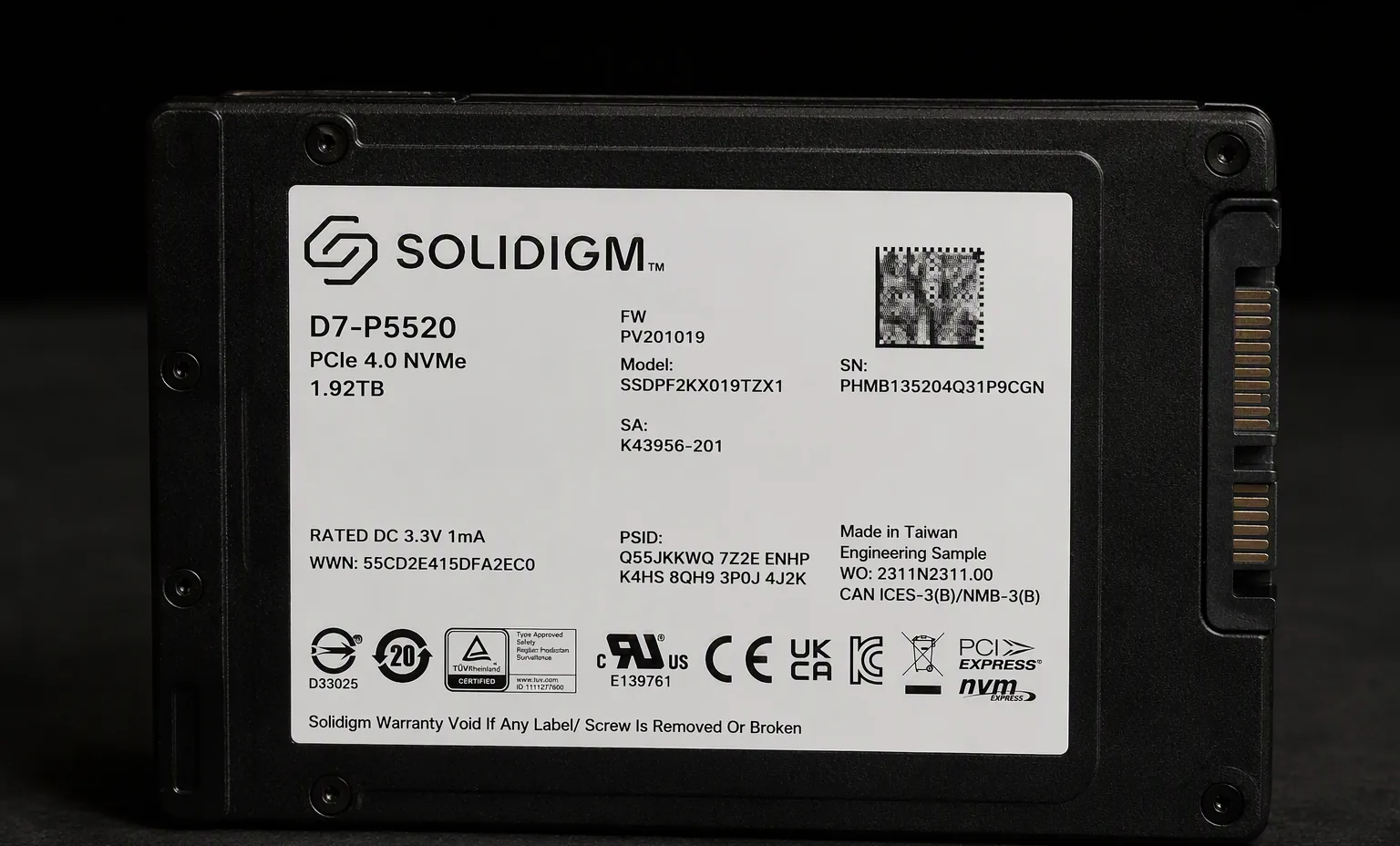 Solidigm D7-P5520 1.92TB enterprise U.2 NVMe SSD, label view, dark product photography.